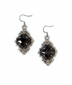 "These richly detailed antiqued silver plated filigree earrings, are adorned with dazzling JET BLACK glass rhinestones that perfectly accentuate a larger jewel in the center of each. Earrings measure 2\" tall, including stainless steel earring hooks, and are 1\" wide. Listing is for earrings ONLY. Matching necklace is available in our store. These are available in a variety of stone colors in our store, along with matching necklaces. If you don't see something available in a stone color you'd li Antique Silver Earrings, 1920's Style, Rainbow Topaz, Earrings Gothic, Gothic Earrings, Choker Pendant, Gothic Accessories, African Girl, Filigree Earrings