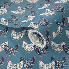 a blue and white wallpaper with chickens on it's sides, in the style of hens