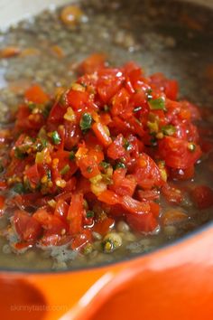 chopped tomatoes and other vegetables in a pot