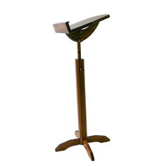 a wooden stand with a light on it