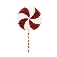 a red and white lollipop with glitter on it's top is shown