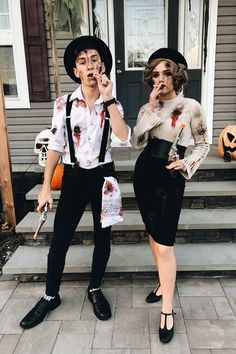 two people dressed up as zombies for halloween