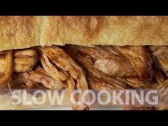 a close up of a sandwich with meat on it and the words slow cooking written in large letters