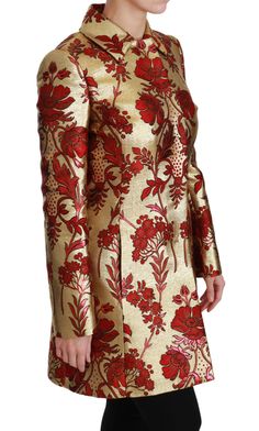 Discover the epitome of luxury and style with this exquisite Dolce & Gabbana trench coat. This stunning piece, brand new with tags, showcases a radiant red and gold floral brocade design, perfectly complemented by a luxurious silk inner lining for that extra touch of opulence. With a sleek push-button closure and meticulous logo detailing, it is a testament to the brand’s commitment to high craftsmanship straight from the fashion heart of Italy. Make it yours and embody elegance with every step. Mantel Cape, Brocade Coat, Brocade Jacket, Dolce Gabbana Jacket, Brocade Dresses, Trench Jacket, Cape Coat, Dolce E Gabbana, Gold Floral