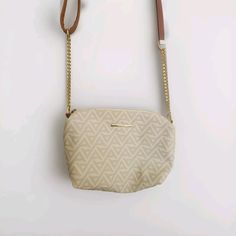 This Aldo Women's Crossbody Purse Shoulder Bag in Cream is the perfect accessory for any outfit. With a zip closure and faux leather and metal handle/strap material, this bag is both stylish and functional. The small size makes it great for carrying your essentials while on-the-go. New without tag.. Trendy Satchel With Zipper Closure, Trendy Crossbody Shoulder Bag With Metal Zipper, Trendy Shoulder Bag With Metal Zipper, Crossbody Satchel With Zipper Closure, Chic Shoulder Bag With Metal Zipper For Travel, Crossbody Satchel With Zipper Closure As Fashion Accessory, Fashion Accessory Crossbody Satchel With Zipper Closure, Chic Rectangular Shoulder Bag With Metal Zipper, Everyday Bags With Metal Zipper