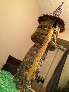 there is a tower made out of rocks and candy