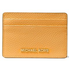 Upgrade your essentials with the Michael Kors Women's Jet Set Leather Card Holder. Crafted from premium leather with a polyester lining, this card holder offers both style and durability. The stylish gold-tone exterior hardware adds a touch of elegance to your everyday carry. Size: 3-3/4"W x 2-3/4"H x 1/10"D..  Color: Yellow.  Gender: female.  Age Group: adult. Gold Leather Card Holder With Interior Slots, Michael Kors Rfid Blocking Rectangular Wallet, Michael Kors Gold Wallet For Everyday Use, Michael Kors Rfid-blocking Rectangular Wallet, Gold Michael Kors Wallet For Everyday Use, Michael Kors Rfid-blocking Wallet, Classic Gold Leather Card Holder, Michael Kors Wallets With Card Slots For Daily Use, Michael Kors Modern Leather Wallets