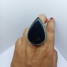 HANDMADE Gemstone-Black Onyx Shape-pear Metal-925 Sterling Silver large boho ring About gemstone- Black Onyx is the birthstone for Leo. It is the stone of protection.This elegant smooth textured stone is said to have immense healing and spiritual benefits.Black Onyx symbolizes peace,harmony and love and good luck.Black Onyx is well known to remove negativity and act as a guard for the wearer. you can pick your own gemstone for the ring you order. We accept custom and personalized order. It can b Handmade Black Crystal Ring In Sterling Silver, Handmade Black Oval Crystal Ring, Handmade Black Open Ring Jewelry, Unique Black Crystal Gemstone Ring, Elegant Black Jewelry With Large Stone, Black Bohemian Rings With Gemstone, Black Bohemian Gemstone Rings, Elegant Obsidian Ring Jewelry, Bohemian Black Gemstone Rings