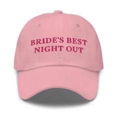 the bride's best night out hat is pink and has red lettering on it