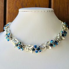 Lisner Necklace Brilliant Blues Multiple Shades of Blue AB Rhinestones with Dimensional Silver-tone Grape Leaves. In Excellent Condition  16" adjustable length Choker Necklaces, Grape Leaves, Shades Of Blue, Choker Necklace, Vintage Jewelry, Silver Tone, Jewelry Necklaces, Shades, Silver