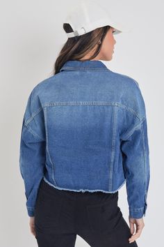 Add some edgy layers to your go-to outfits this season with our Women's Cropped Denim Jacket With Raw Hem. Complete with all standard trademarks: buttoned flap pockets, button-cuff long sleeves, exposed front button closure, basic collar, and a cropped fit with raw hem.Measurement (Based on size M)- Sleeve Length (From shoulder seam): 18” - Length: 21” - Chest: 22.5” Composition:- 81% Cotton/ 10% Polyester/ 9% Rayon• Machine wash cold.• Model is wearing a size S. Ymi Jeans, Blue Q, Cropped Denim Jacket, Denim Jacket Women, Cropped Denim, Medium Blue, Flap Pocket, Women Crop, Denim Jacket