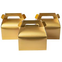 three gold boxes with handles on each side