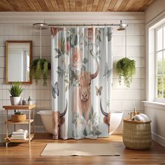 a bathroom with a cow and flowers shower curtain