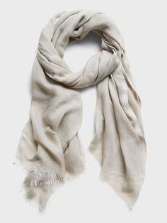 Accent your look with this soft scarf, crafted in a lightweight gauze fabric so you can layer it through the seasons.  Length: 78" (198cm) Width: 28" (71cm) Casual Solid Shawl Scarves, Casual Solid Shawl Scarf, Casual Solid Color Shawl Scarves, Casual Solid Color Shawl Scarf, Trendy Beige Scarves For Spring, Chic Beige Shawl For Spring, Casual Cream Scarf, One Size, Casual Cream Scarf One Size, Casual Beige Shawl For Spring