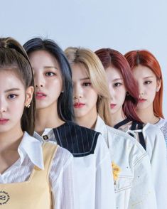 the girls are all wearing different colored hair colors and hairstyles, with one girl looking at the camera