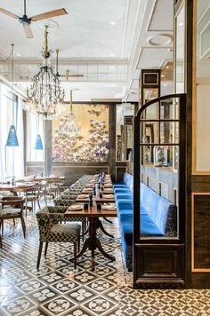 an empty restaurant with tables and chairs