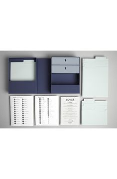 an assortment of office supplies including file folders and binders