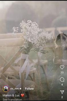 a bouquet of flowers sitting on top of a wooden bench