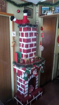 a brick fireplace decorated for christmas with decorations