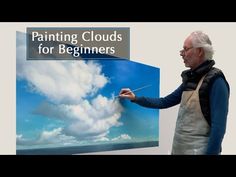 an older man is painting clouds for beginners