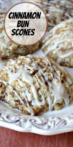 cinnamon bun scones with icing on a white plate