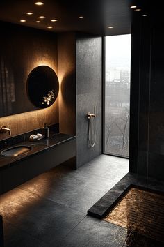 a bathroom with a sink, mirror and shower head in it's dark room