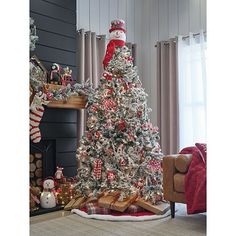 a decorated christmas tree in a living room