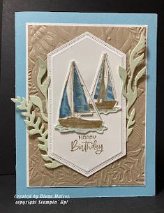 a card with two sailboats on it