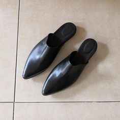 "Flat Leather Shoes Black Mules, Leather Mules, Women Shoes, Leather Sandals, Slip On, Black Pointed Mules, Women's Closed toe Sandals ------------------------------ We use the finest leather and the most comfortable shoe shape. We use a manufactured durable sole so that you can enjoy the most out of these gorgeous shoes. All of our shoes are handmade, created with careful attention to comfort, detail and style. ------------------------------ Sandals Details: * Color - Black * Upper Materials: L Black Leather Slip-on Mules, Leather Pointed Toe Slip-on Sandals, Leather Sandals With Pointed Toe And Slip-on Fit, Leather Slip-on Sandals With Pointed Toe, Black Closed Toe Heels With Rubber Sole, Leather Sandals With Slip-on Fit And Pointed Toe, Black Leather Sandals With Almond Toe, Black Pointed Toe Heels With Rubber Sole, Black Heels With Rubber Sole And Pointed Toe