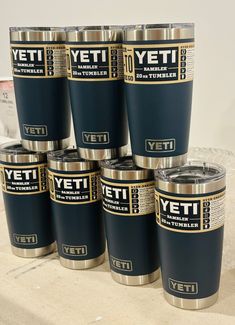 the yeti tumblers are stacked on top of each other