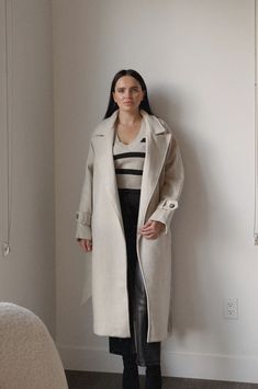 cream oversized wool trench coat Chic Long Wool Coat With Self Belt, Chic Belted Beige Wool Coat, Beige Long Wool Coat With Belted Cuffs, Winter Beige Belted Pea Coat, Chic Beige Wool Coat, Beige Belted Pea Coat For Winter, Belted Beige Pea Coat For Winter, Beige Belted Long Wool Coat, Cream Long Wool Outerwear