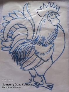 a blue and white drawing of a rooster on a piece of paper with writing underneath it