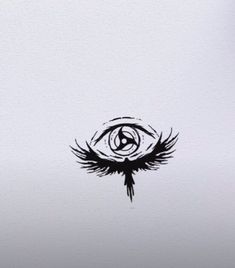 an eye with wings drawn on the side of it, in front of a white background