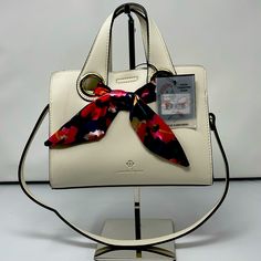 Nanette Lepore Regina Shrunken Satchel Handbag Vegan Leather White Removable Scarf - Brand New!! Rice Color Material & Color: White Faux Leather Length(In.): Approx. 10" Width(In.): Approx. 4 “ Height(In.): Approx. 7” Nanette Lepore Handbags, Summer Formal Bags With Double Handle, Elegant Top Handle Satchel For Summer, Elegant Double Handle Satchel For Summer, Elegant Double Handle Satchel For Spring, Elegant Summer Satchel For Shopping, Elegant Spring Satchel, Elegant Summer Satchel With Removable Pouch, Elegant Spring Satchel With Detachable Strap