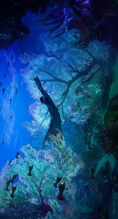 an underwater scene with many fish swimming in the water and people standing on the bottom