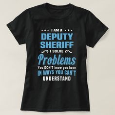 a black t - shirt with the words i am a hopper feeder solve problems in ways you can't understand