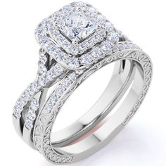 a white gold engagement ring set with an intricate design and diamond accents on the band