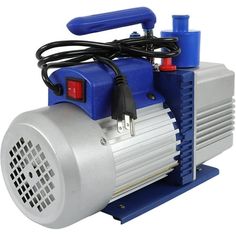 a small air compressorer sitting on top of a blue and white stand with wires