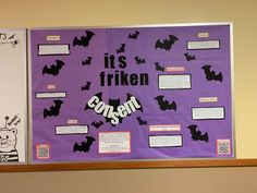 a bulletin board with bats on it and writing in the center that says it's friken