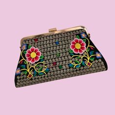 Beautiful Mexican embroidered floral design clutch with cotton strap. Two pockets inside and comes with black removable strap. Spring Evening Bag With Detachable Strap, Rectangular Embroidered Multicolor Clutch, Black Embroidered Pouch Evening Bag, Black Embroidered Clutch, Multicolor Floral Embroidery Pouch Clutch, Spring Evening Clutch With Detachable Strap, Black Bags With Floral Embroidery For Spring, Traditional Floral Embroidered Clutch For Everyday, Traditional Floral Embroidery Clutch For Everyday