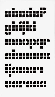 a black and white typeface is shown in the form of squares, which appear to be made out of paper