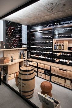 a wine cellar filled with lots of bottles