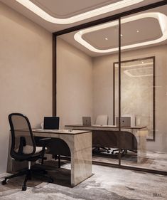 an office with a marble desk and black chair