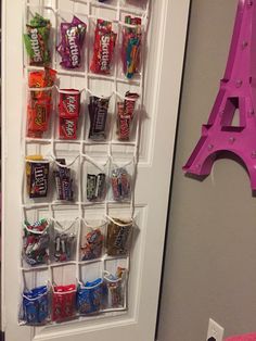 the door is decorated with candy bars and eiffel tower