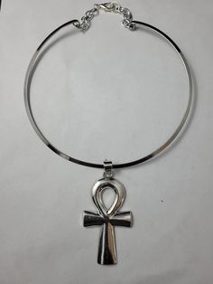 "Beautiful necklace features a 3 1/2\" silver plated ankh on a 15\" silver plated choker.  Please come back and visit to check for new unique designs.  For more styles visit my Etsy shop: www.etsy.com/shop/SoftlySisterDesigns"