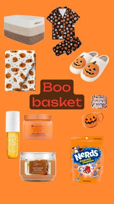 various items are arranged on an orange background with the words boo basket written above them