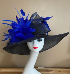 "Wide brim sinamay hat with sinamay bow and feather flowers, elegant, light and comfortable to wear. Perfect for weddings, Royal Ascot horse races, cocktails, tea party, derby, or any hat wearing occasion. Warm tips:  ❤️If you are looking for a customized piece, please send me a message and let's create something unique just for you!  ❤️Group discount on 3 or more pieces, please contact me for further information on group discount. ❤️Due to the nature of my items, I do not accept returns, but contact me if there's problem with your order ❤️Custom Hat cannot be exchanged or returned Key Features: Wide brim Appr: 6-6.5\" Head Grith Appr: 22.5\" and adjustable to fit sizes smaller than 22.5\" Crown Deep Appr: 4.5\" Processing Time: 1-3 business days About Shipping: ❤️Item(s) are packed and sh Ascot Horse Racing, Feather Flowers, Horse Races, Sinamay Hats, Tea Party Hats, Tea Party Bridal Shower, Kentucky Derby Hats, Feather Flower, Kentucky Derby Hat