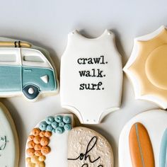 decorated cookies with the words crawl, walk, surf on them and an image of a vw bus