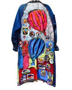 the back of a jacket with an image of a hot air balloon painted on it