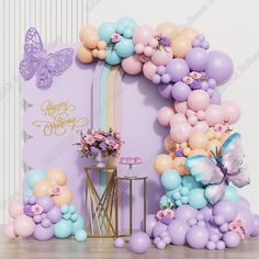 a birthday party with balloons and flowers on the side table, butterflies flying around it